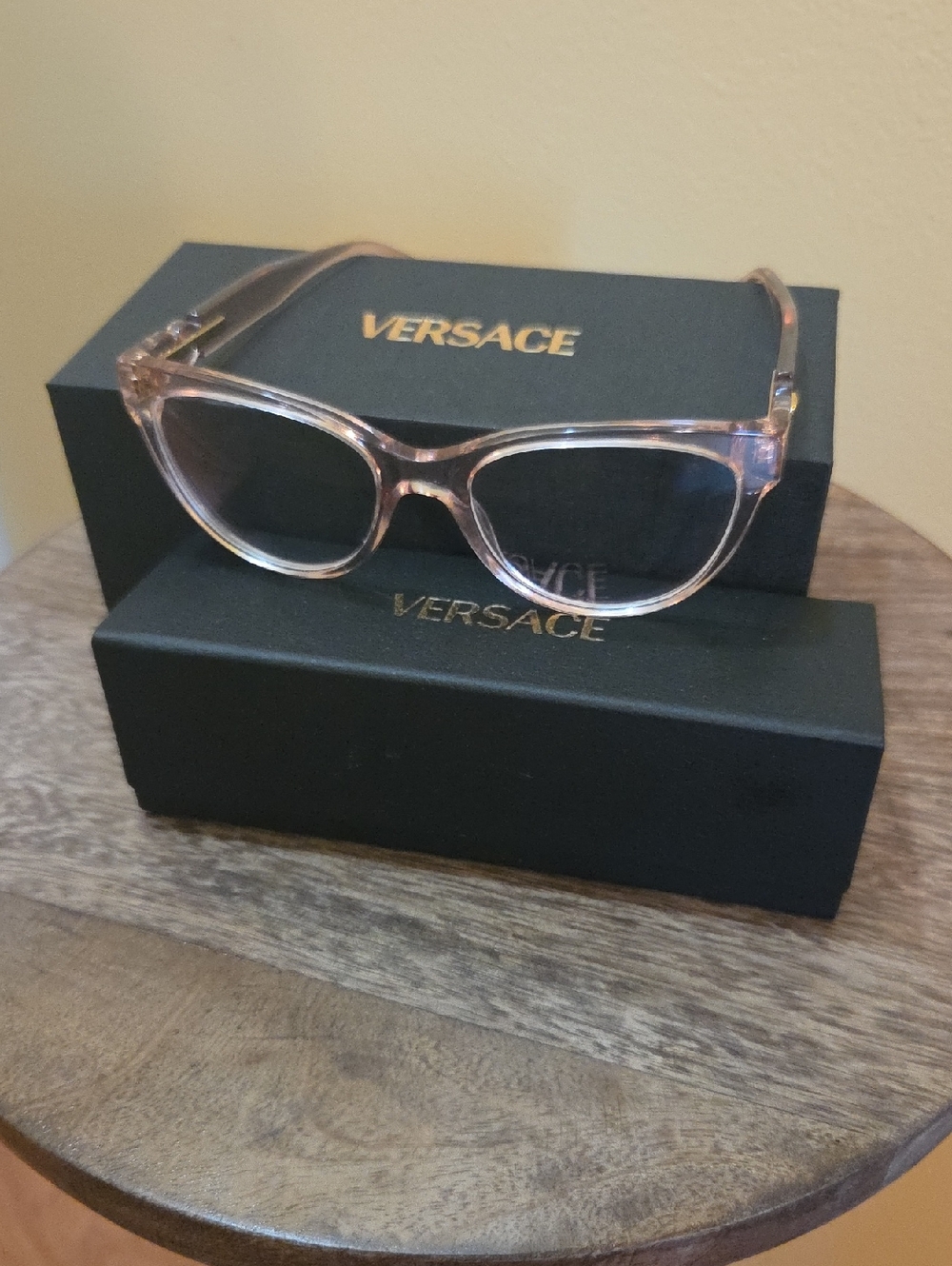 Versace Transparent Pink Eyeglasses.